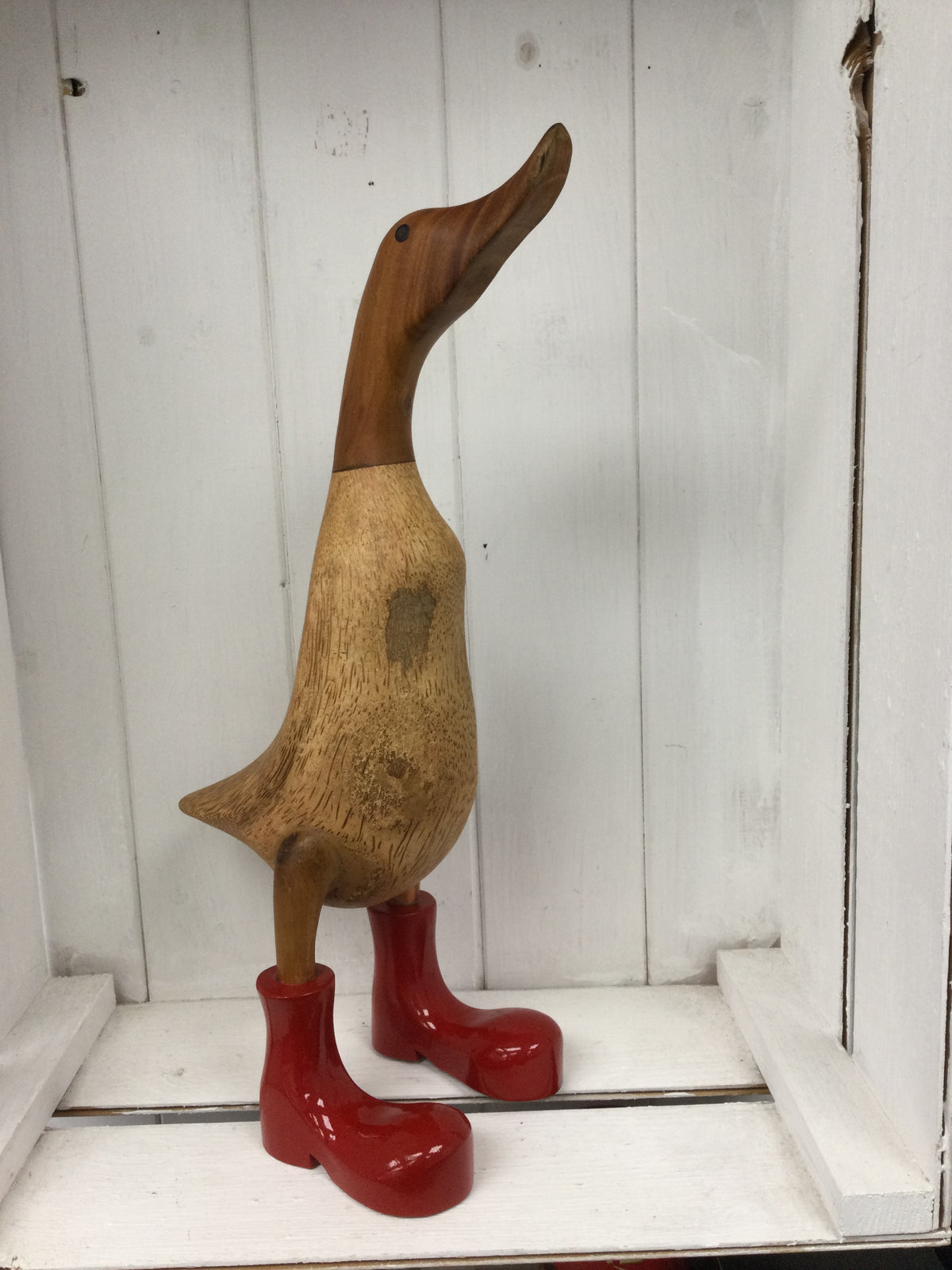 Wooden Duck with red boots