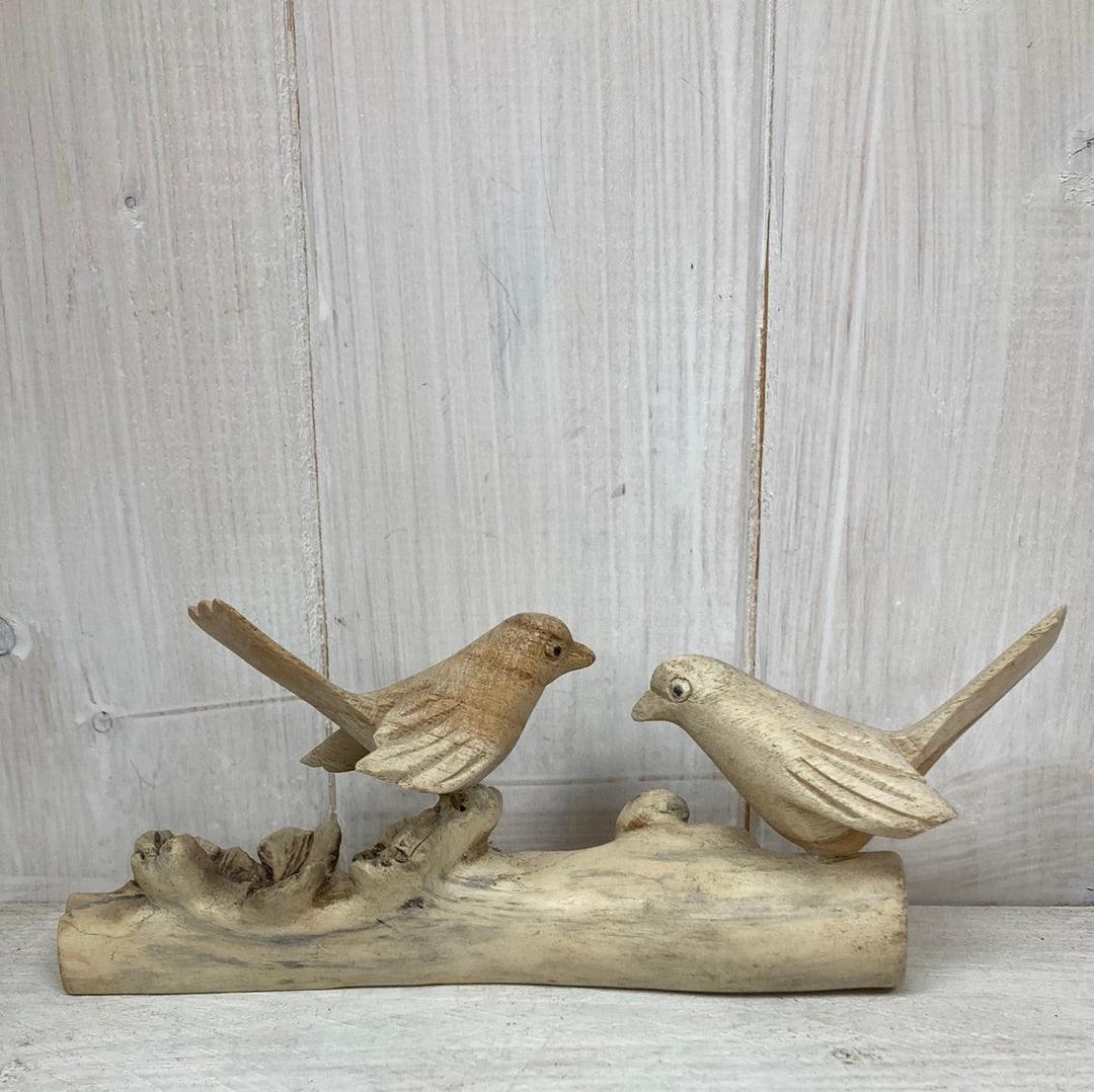 Two birds on a branch - The Coast Office