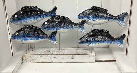 Set of 5 carved fish on a stand