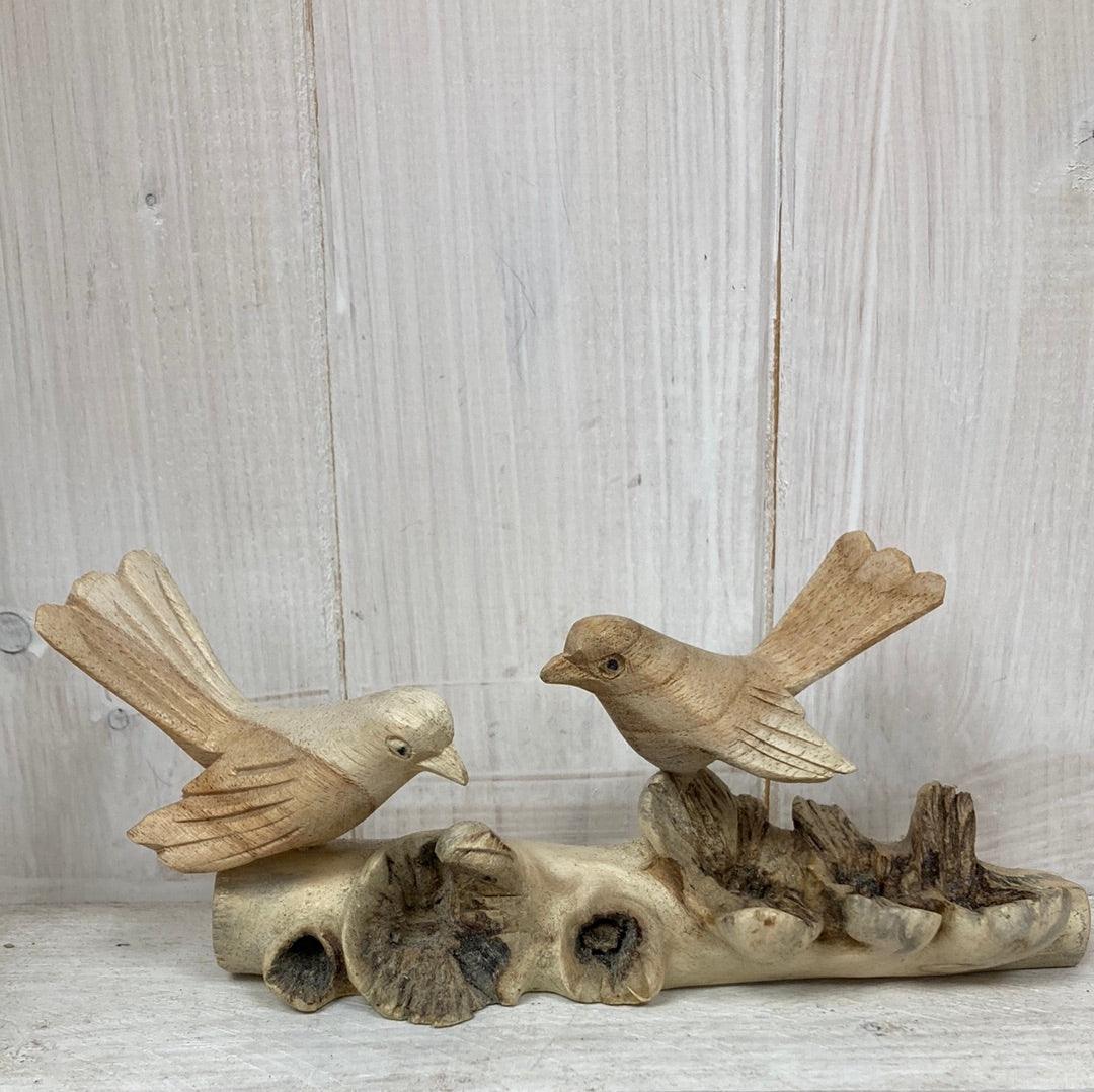 Two birds on a branch - The Coast Office